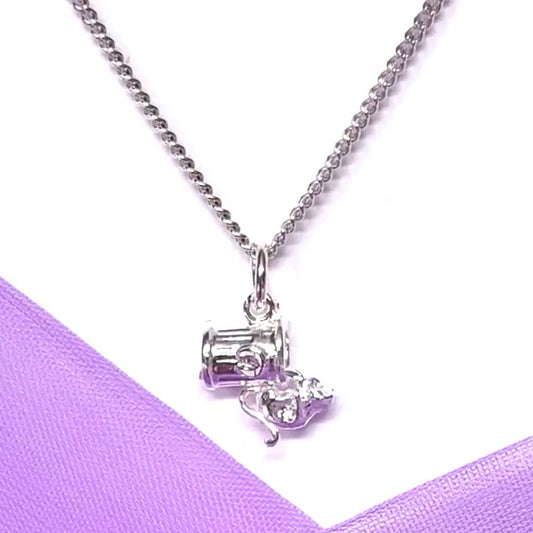 Cat on a dustbin sterling silver necklace