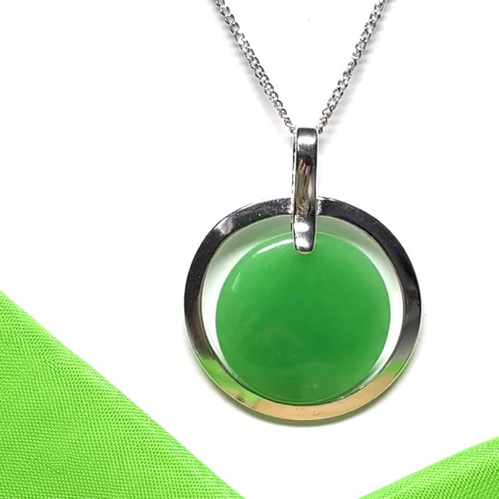 Large sterling silver round shaped green real jade necklace halo style pendant with a chain included with it