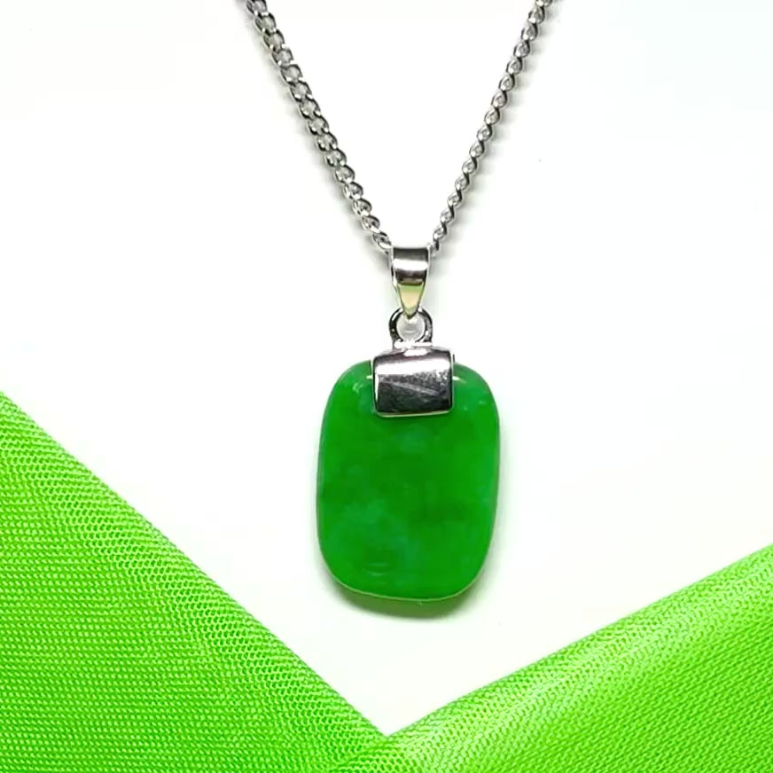 Real green jade necklace with a cushion shaped stone sterling silver with a chain included