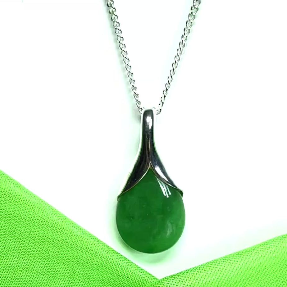 Real green jade necklace in a pear shaped sterling silver pendant