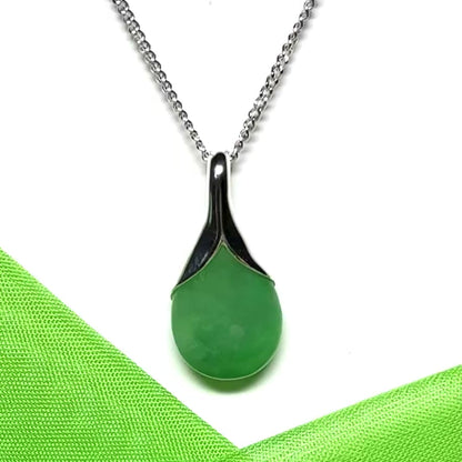 Real green jade tear drop dotted sterling silver pear shaped pendant including a chain