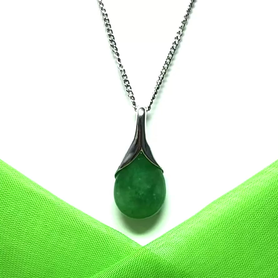 Real green jade necklace in a teardrop or pear shaped, a timeless designed pendant with a chain