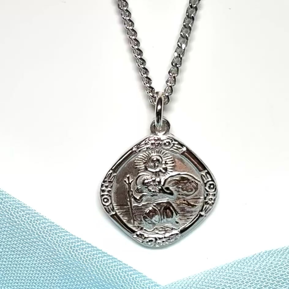 Video of a sterling silver solid cushion shaped St. Christopher necklace double sided with chain