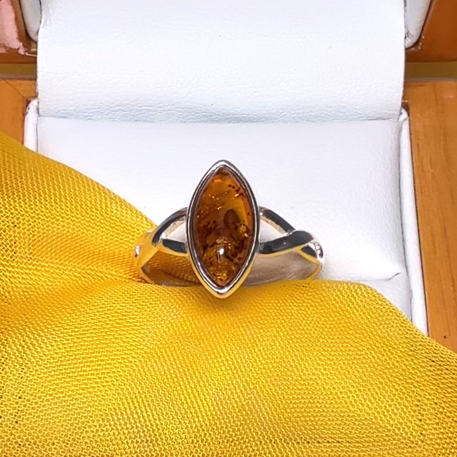 Real amber ring sterling silver marquise shaped smooth rubbed over setting pierced shoulders
