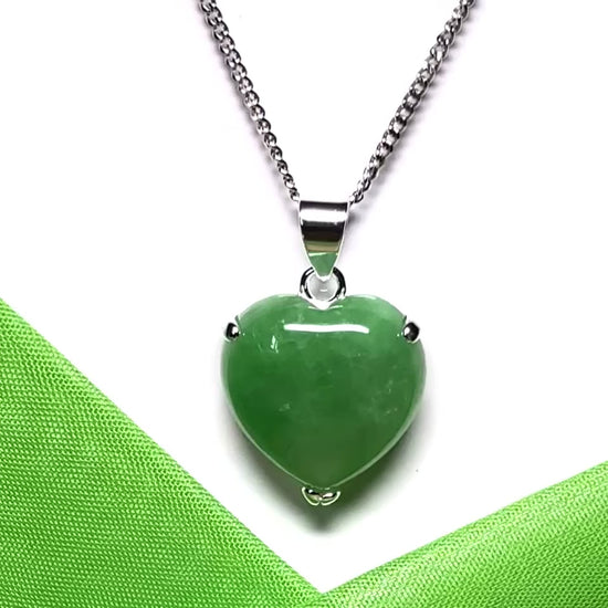 A real light green jade necklace heart shape sterling silver pendant