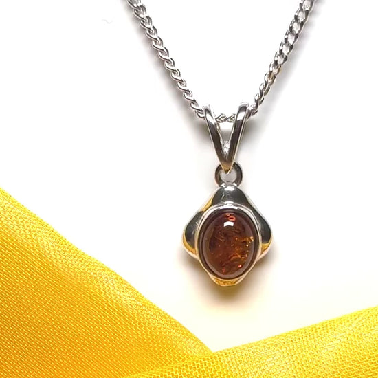 Orange real amber oval cushion sterling silver necklace pendant