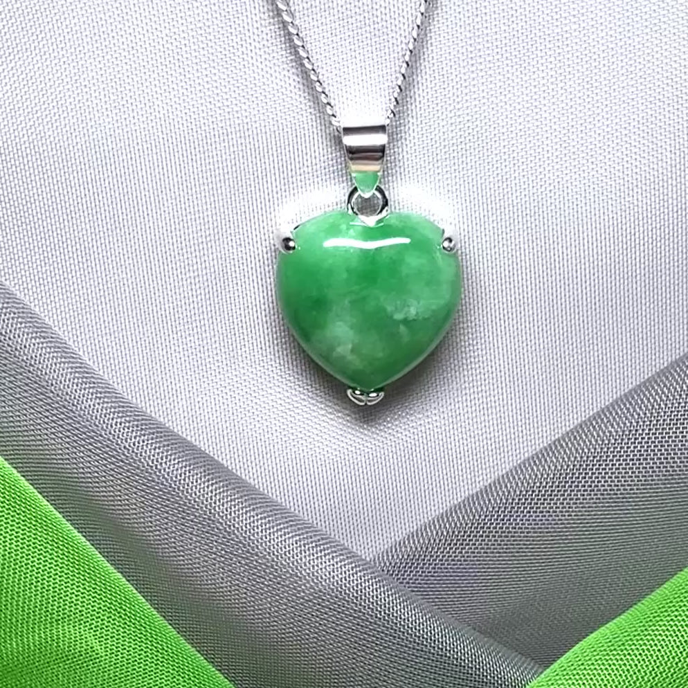 A really stunning pendant with a real green jade necklace heart shaped sterling silver