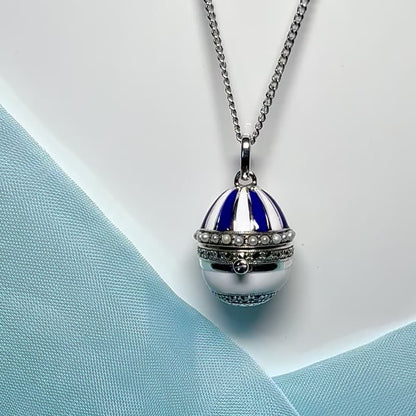 Sterling silver blue and white enamelled egg shaped opening pendant real freshwater pearls