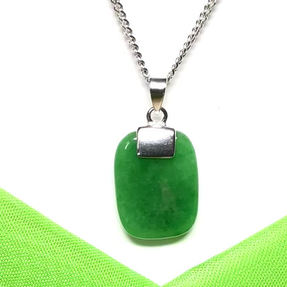 A stunning sterling silver cushion shaped real green jade necklace pendant with a chain included