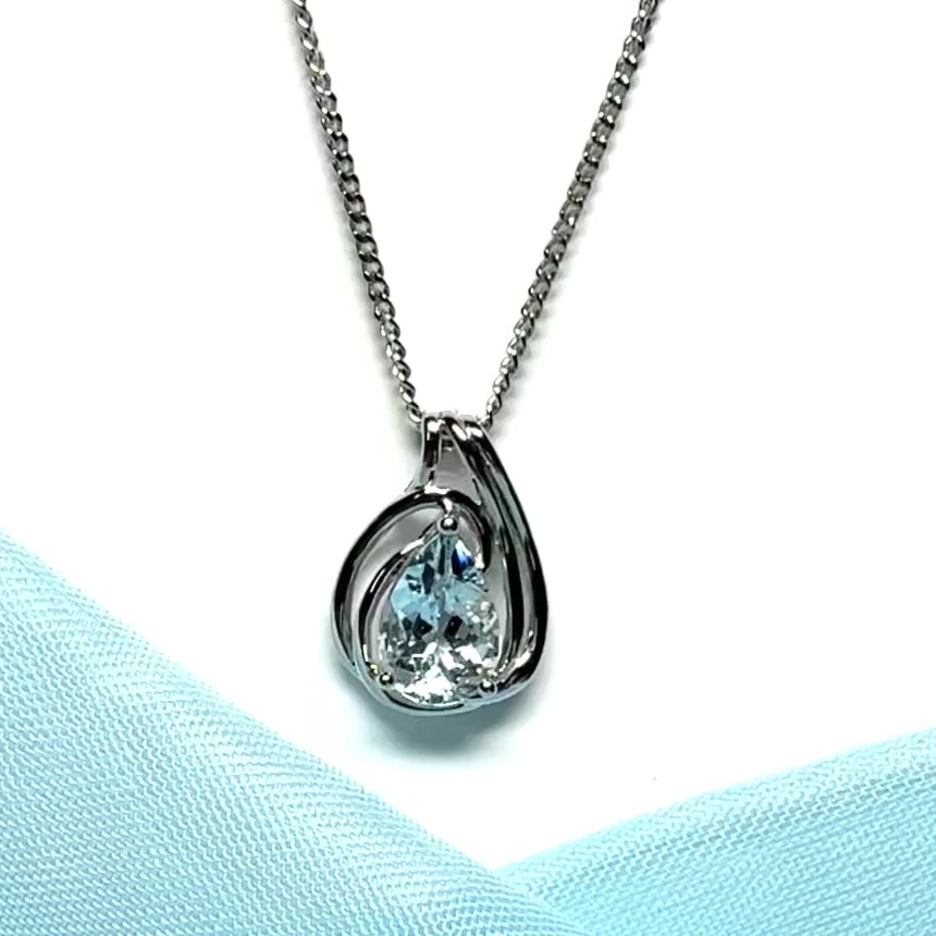 Real aquamarine white gold necklace swirl designed pear shaped stone