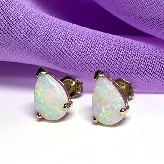Real opal stud earrings Yellow gold claw setting with teardrop stones