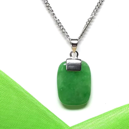 Real green jade necklace having a cushion shaped stone sterling silver with a chain included