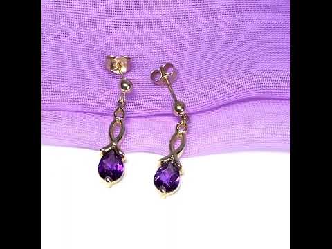 A pair of real amethyst drop earrings pear shaped yellow gold