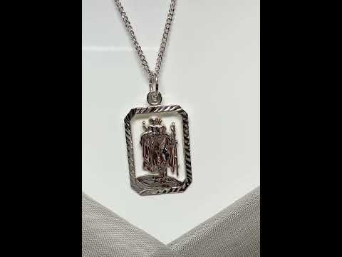 Video of a Mens solid sterling silver octagonal rectangle open pierced St.Christopher