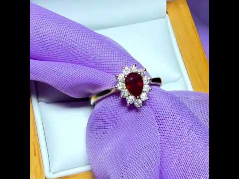 Video of a Real ruby and real diamond pear teardrop shaped cluster ring yellow gold