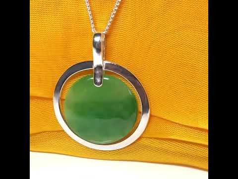 Large silver round shaped green real jade necklace pendant with a chain