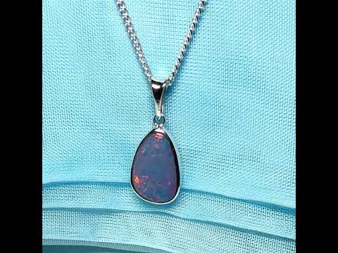 Video of a real dark opal rubbed over sterling silver necklace 