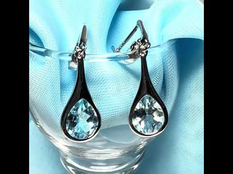 Video of a pair of real blue topaz sterling silver dropped earrings pear shaped stones