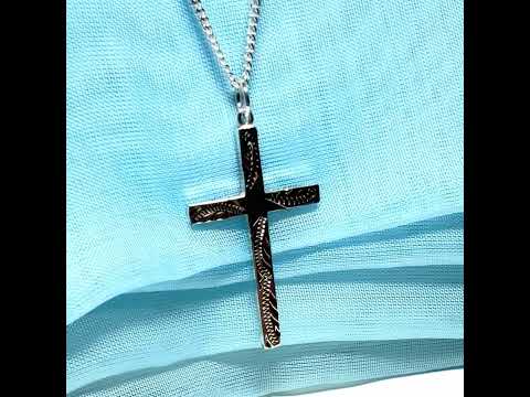 Large cross sterling silver with a patterned design