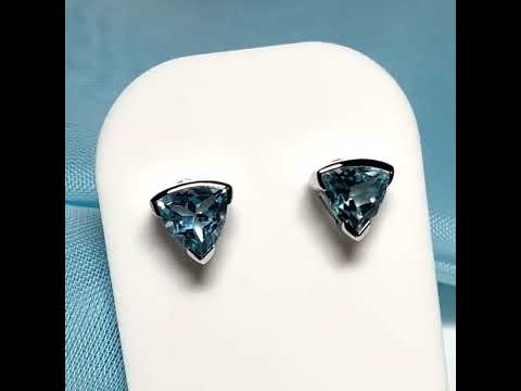 Video of a Triangle shape real blue topaz sterling silver earrings