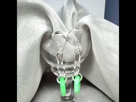 Video of a rounded shaped real green jade sterling silver looped dangling dropped earrings