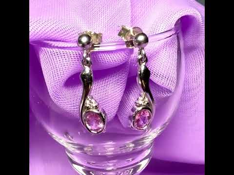 Video of a Real pink sapphire drop earrings with diamond white gold