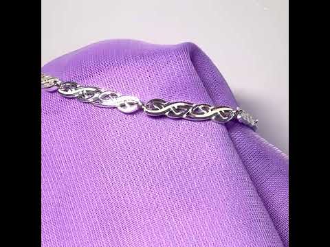 Ladies sterling silver bracelet fancy solid patterned Celtic link