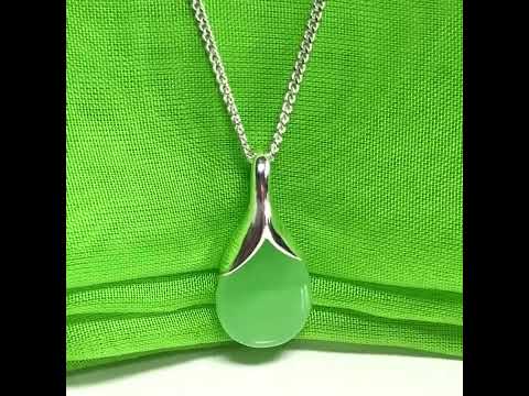 A stunning real green jade necklace in a teardrop, a timeless designed pendant and chain
