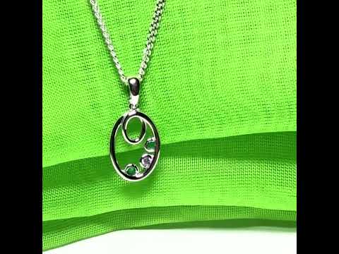 Video of a Real green emerald sterling silver oval necklace pendant with cubic zirconia