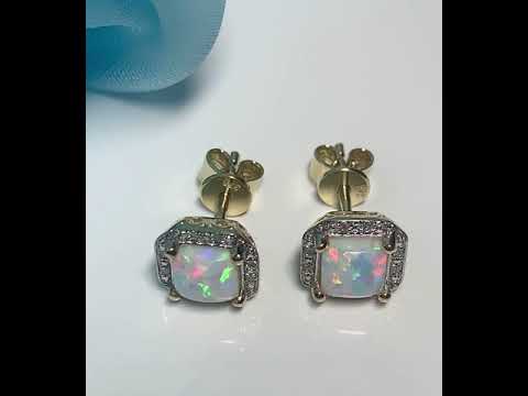 Video of a pair of Square opal and diamond yellow gold stud cluster earrings