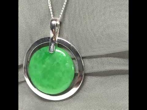 Real green jade necklace in a large round shape with a stunning designed halo pendant