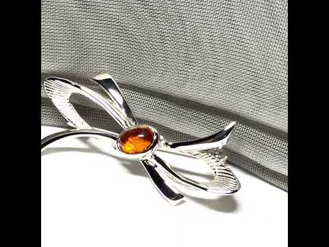 video of a Bow Shaped Sterling silver real amber brooch