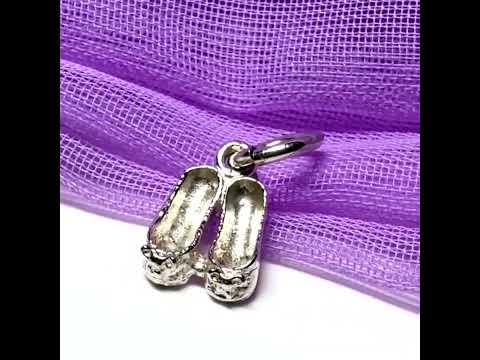 Video of Small ballet slippers charm solid sterling silver ballerina slippers