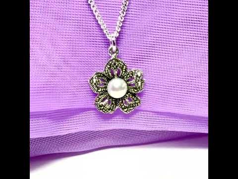 Video of a Pendant real marcasite and real freshwater cultured pearl flower necklace shaped sterling silver