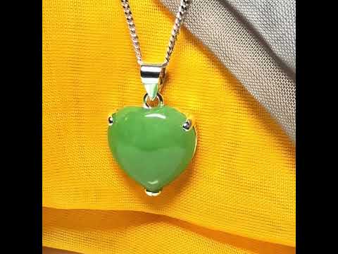 A real green jade necklace heart shaped sterling silver with chain included as well