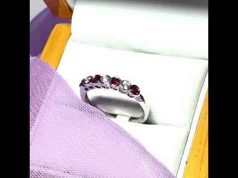 Video of A real ruby and diamond white gold eternity ring smooth setting