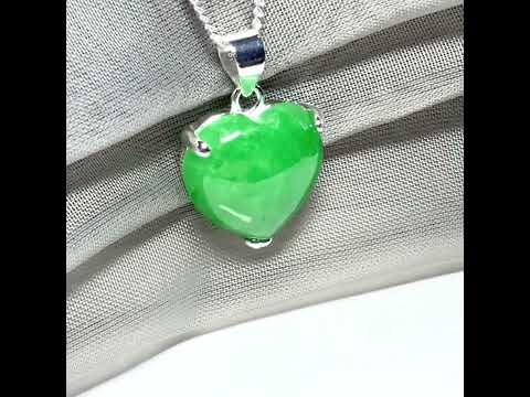 A real green jade pendant heart shape sterling silver necklace with a chain
