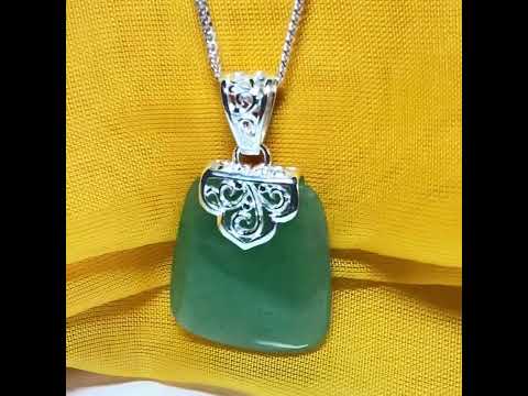 A real jade necklace green sterling silver large cushion shaped, a mesmerising designed pendant