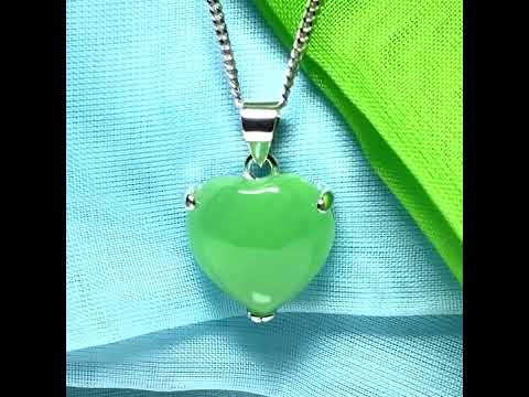 A stunning real green jade necklace heart shaped sterling silver with chain included as well