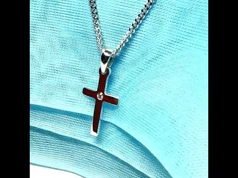 Video of a Diamond set cross solid sterling silver polished necklace