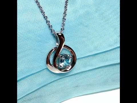 Video of a real blue topaz necklace fancy round twisted swirl design