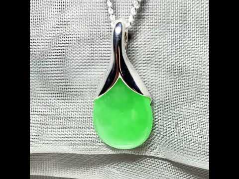 Real green jade pear shaped necklace sterling silver pendant with a chain