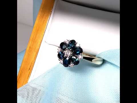 Yellow gold real dark blue sparkling sapphire and diamond round shaped cluster ring