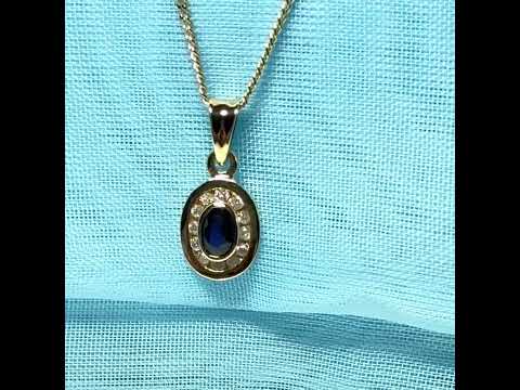 Blue real dark blue sapphire and diamond necklace yellow gold oval shaped cluster pendant