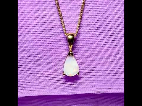 Video of a Pear shaped real opal yellow gold necklace
