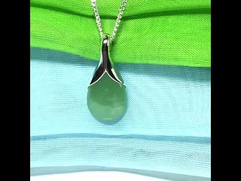 A beautiful real green jade necklace in a teardrop or pear shape, a really stunning designed pendant