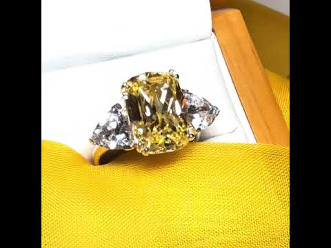 Video of a Large yellow lemon coloured cocktail ring
