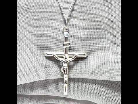 Video of a polished sterling silver crucifix cross necklace including chain