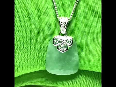 Stunning, a real green jade necklace large shaped with a patterned top pendant