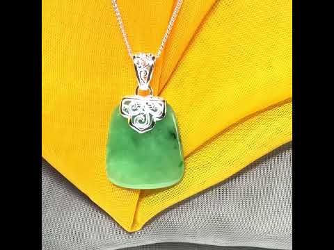 A beautiful real green jade necklace large pendant that is cushion in shape, stunning and irresistible